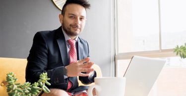 man working from home on a Zoom video call