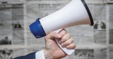 man holding megaphone