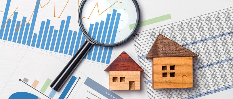 magnifying glass looking at home reports