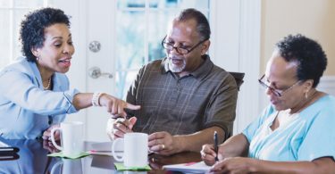 old couple discussing finances