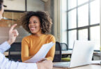 man and woman discussing business