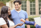 couple getting keys to a new home